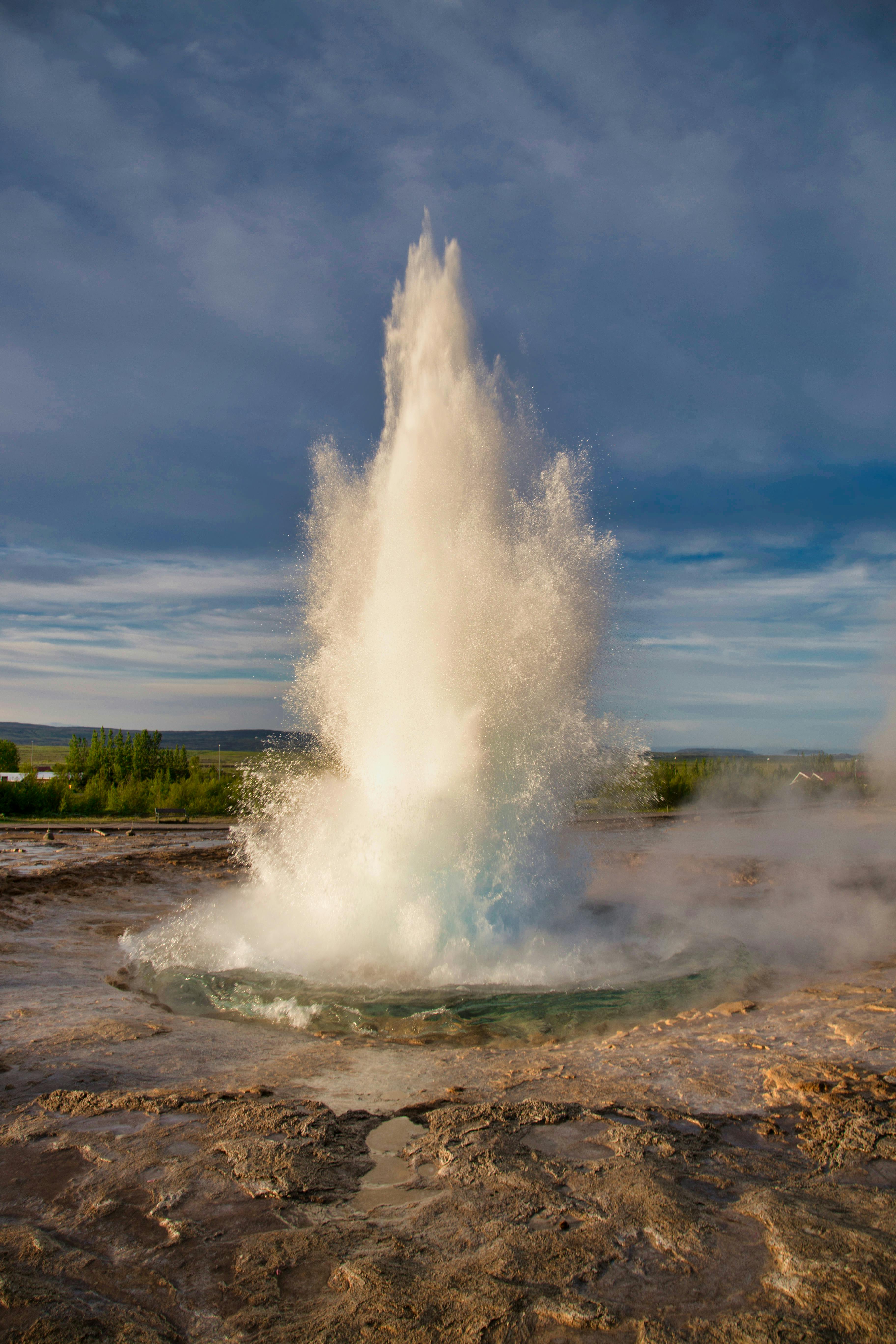 Visitors watching Strokkur geyser at the Geysir geothermal area