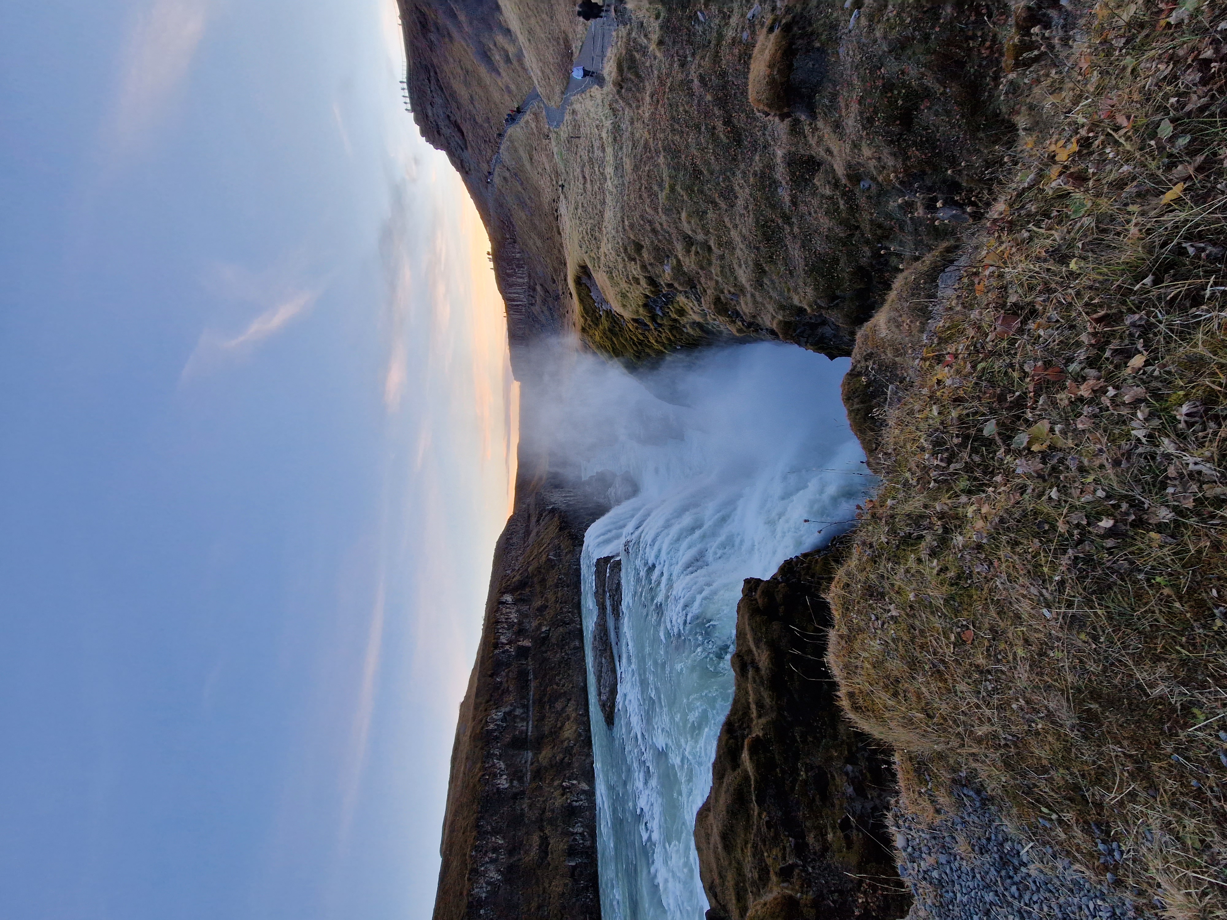 Gullfoss waterfall viewed from the walking path with surrounding landscape