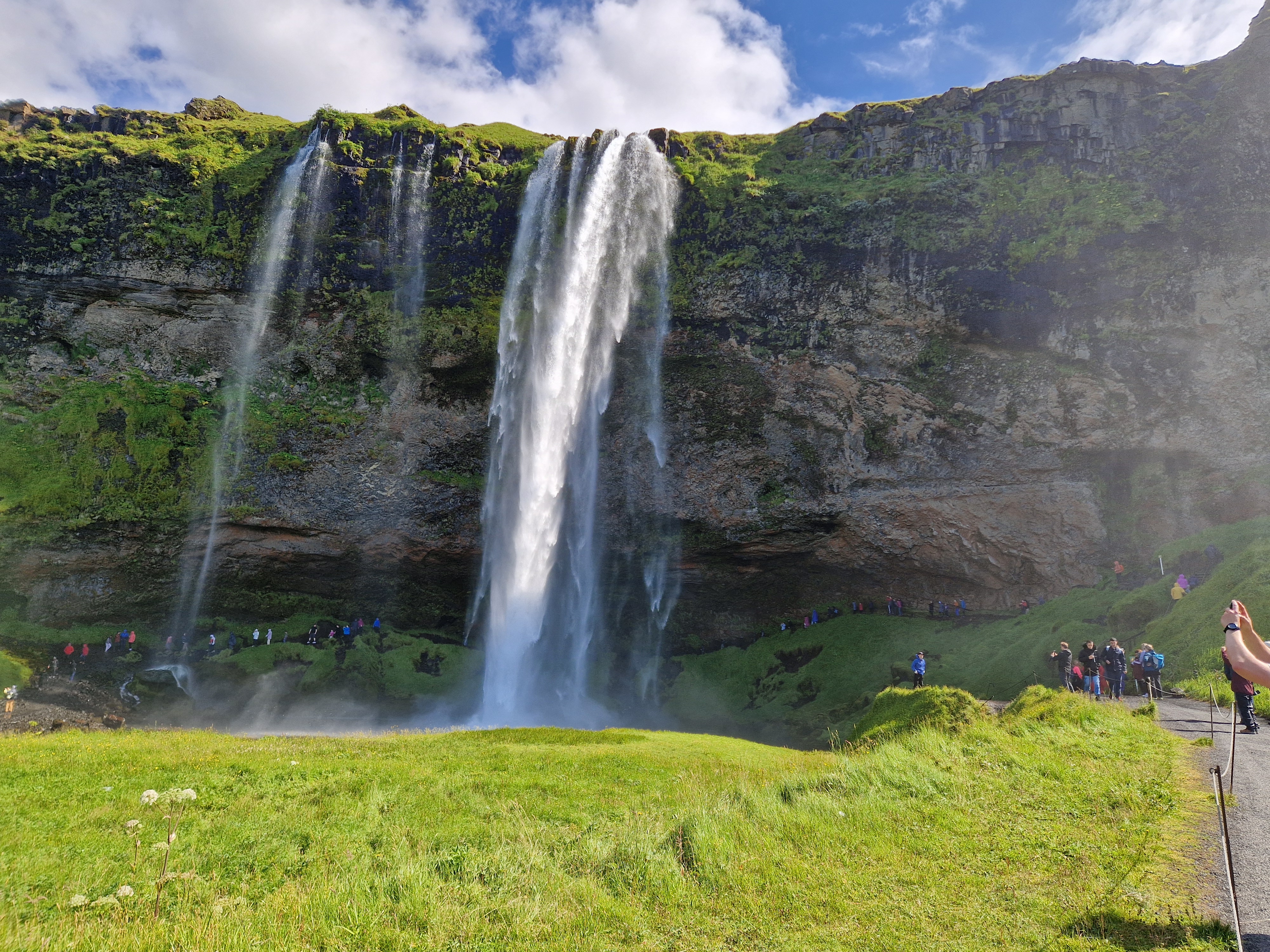 Seljalandsfoss waterfall with path leading behind the cascading water