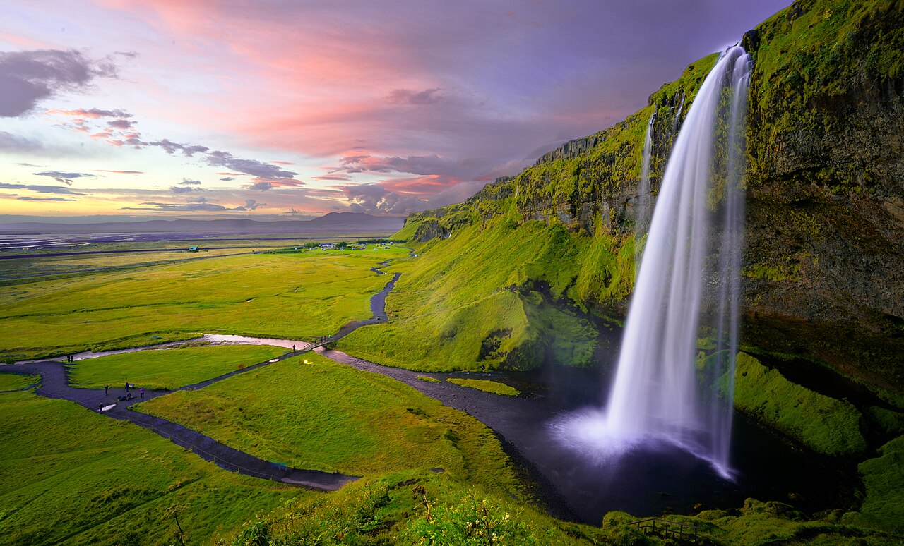 Idyllic panoramic view of Seljalandsfoss waterfall and surrounding landscape